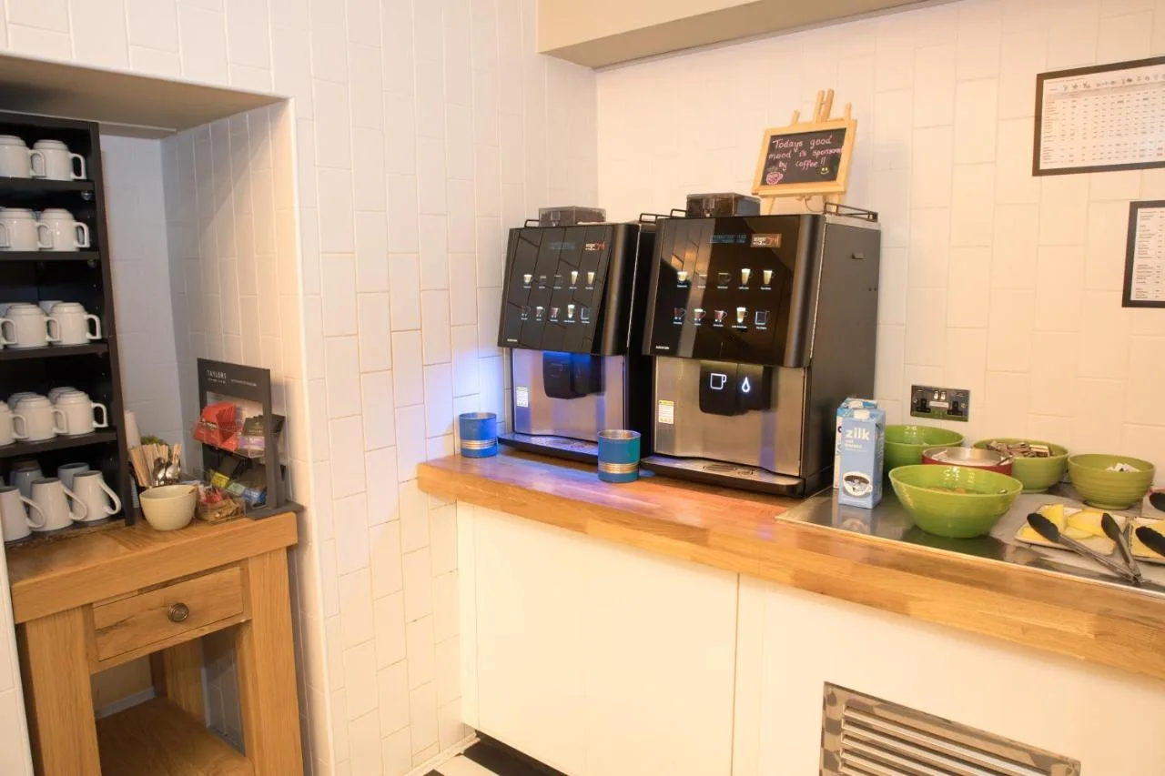 Self-service microwaves in the kitchen area at Holiday Inn York City Centre by IHG, York